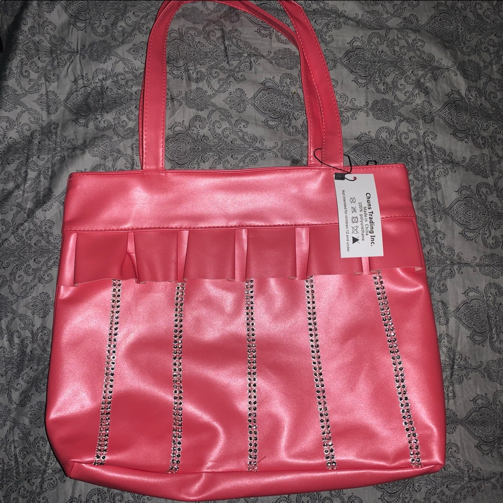 Brand-new pocketbook tags on it